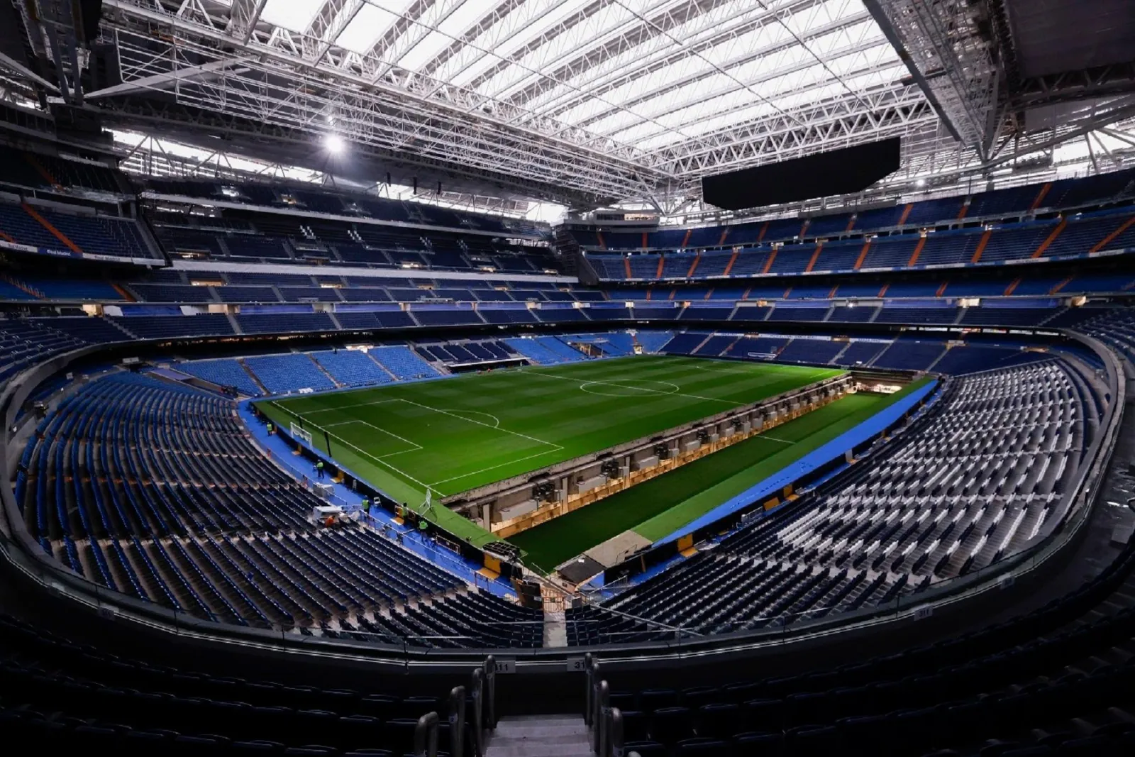 Wide view of the Bernabéu pitch and stands under the new roof