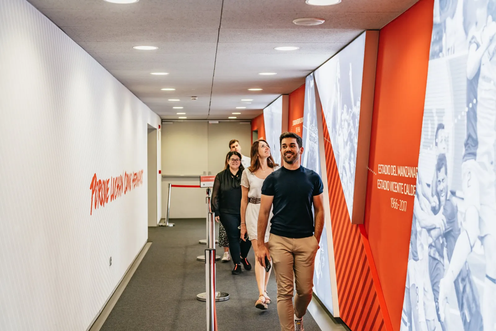 Visitors walking through the Metropolitano players' tunnel corridor