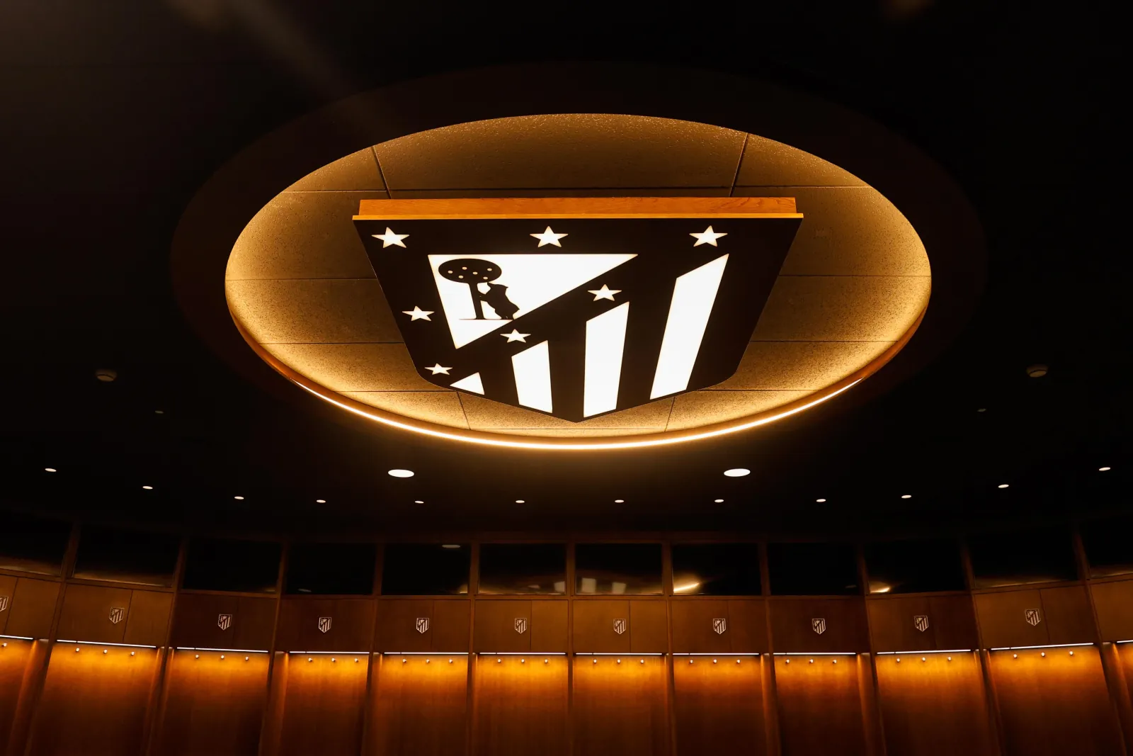 Illuminated Atlético de Madrid crest on a dressing-room ceiling