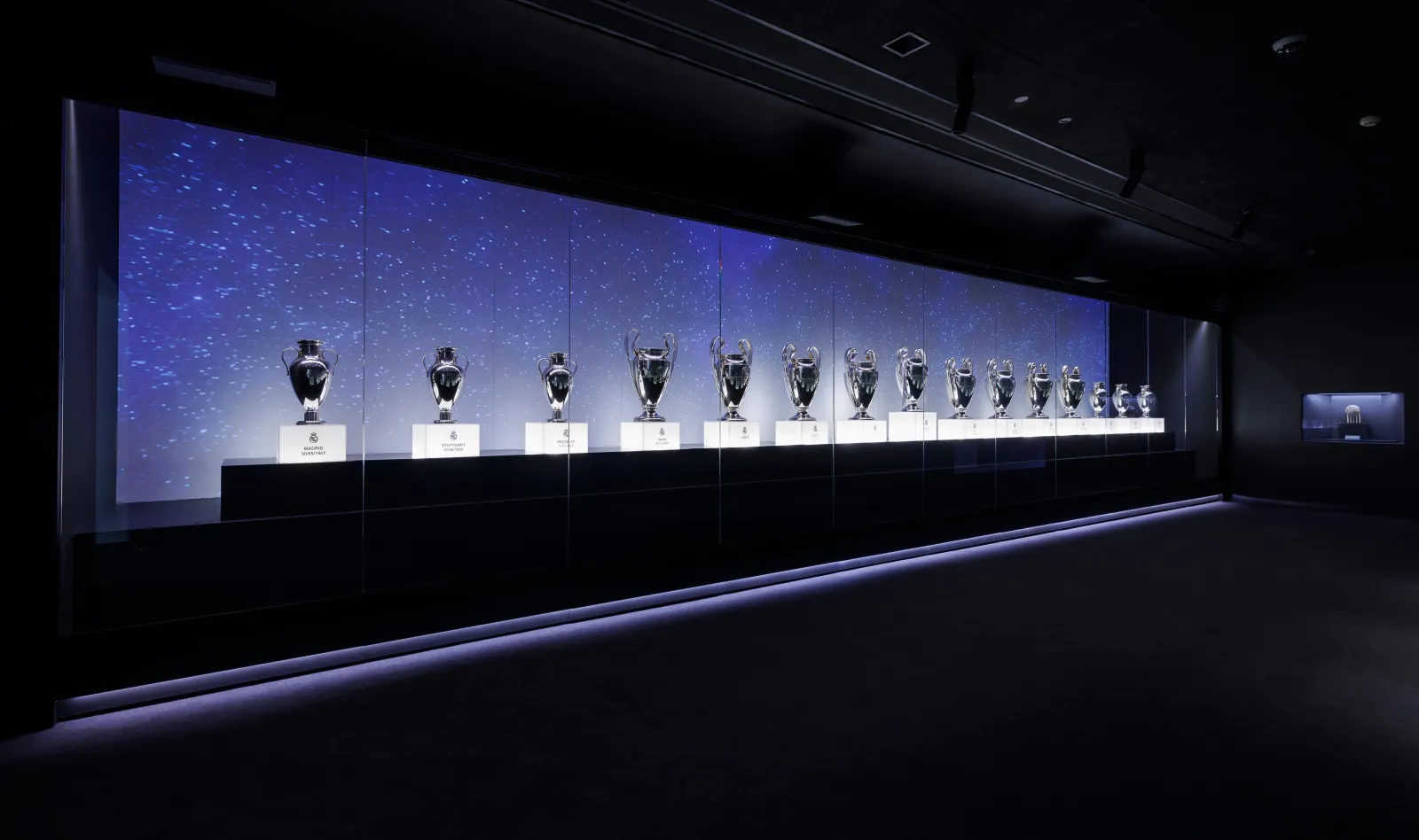 European Cups lit in a row in the Real Madrid museum trophy room
